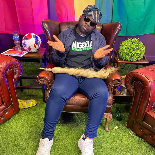 Dr Kelechi Anyikude p.k.a. KelechiAFC poses in the EaglesTracker Nigerian Football T-Shirt
